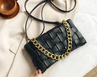 Stylish black intrecciato weave evening bag perfect day to night, versatile bag with gold chain & cross body strap