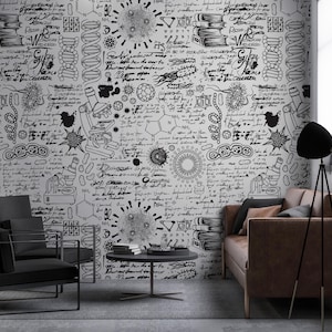 Puede incluir: Una ilustración en blanco y negro de garabatos científicos, incluyendo microscopios, hebras de ADN y fórmulas químicas, impresa en una pared de una sala de estar. La habitación cuenta con un sofá de cuero marrón, una lámpara de pie de trípode negro y una mesa de café de metal negro.