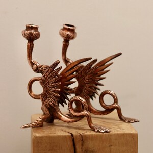 Pair of Copper Griffin Candlestick holders