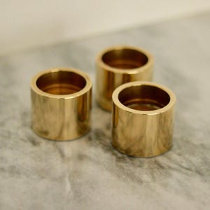Trio of Mid-Century Swedish Brass Candle Holders By Skultuna