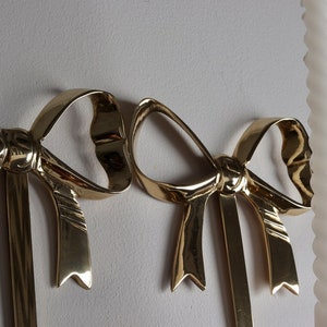 Pair of Vintage Brass Bow Sconces