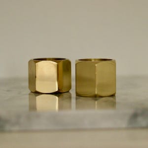 Pair of Mid-Century Swedish Brass Candle Holders by Inga Bjornsson Fakt