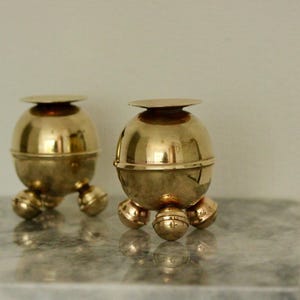 Pair of Mid-Century Swedish Brass Candle Holders