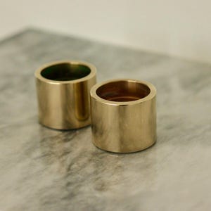 Pair of Mid-Century Swedish Brass Candle Holders