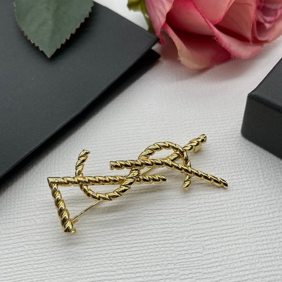 Vintage metal ysl pin - Gem