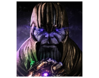 May include: A close-up of Thanos, a comic book character, with a purple face and a gold helmet. He is wearing a gold gauntlet with a purple gem on it. The background is dark purple with a faint glow.