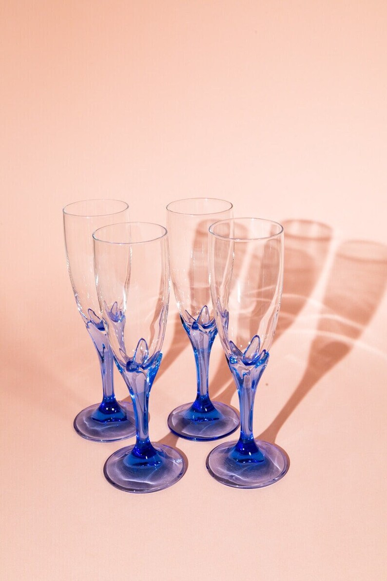 Vintage French champagne glasses with blue stem