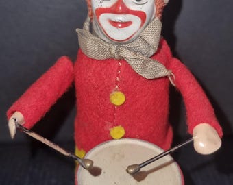 Figura de payaso bailando Schuco con tambor, mecanismo de relojería, circa 1945 - Excelente estado