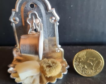 Old wall bracket with tin brushes, dollhouse shop