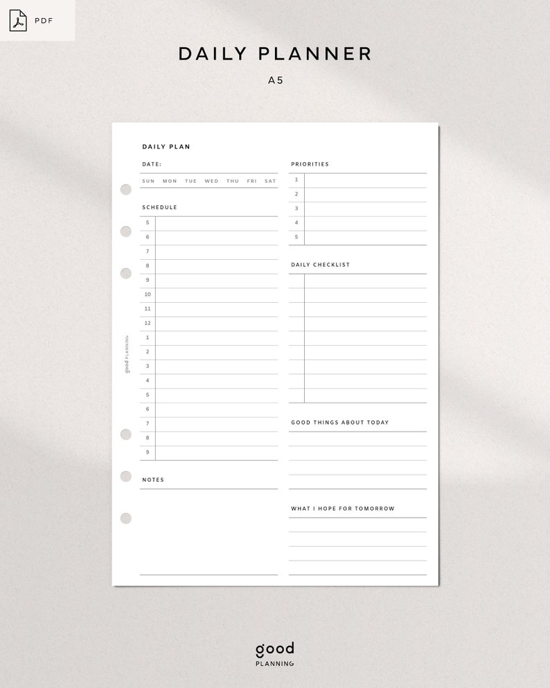 May include: A black and white printable daily planner with sections for daily plan, priorities, schedule, daily checklist, good things about today, notes, and what I hope for tomorrow. The planner is labeled "Daily Planner" and "A5".
