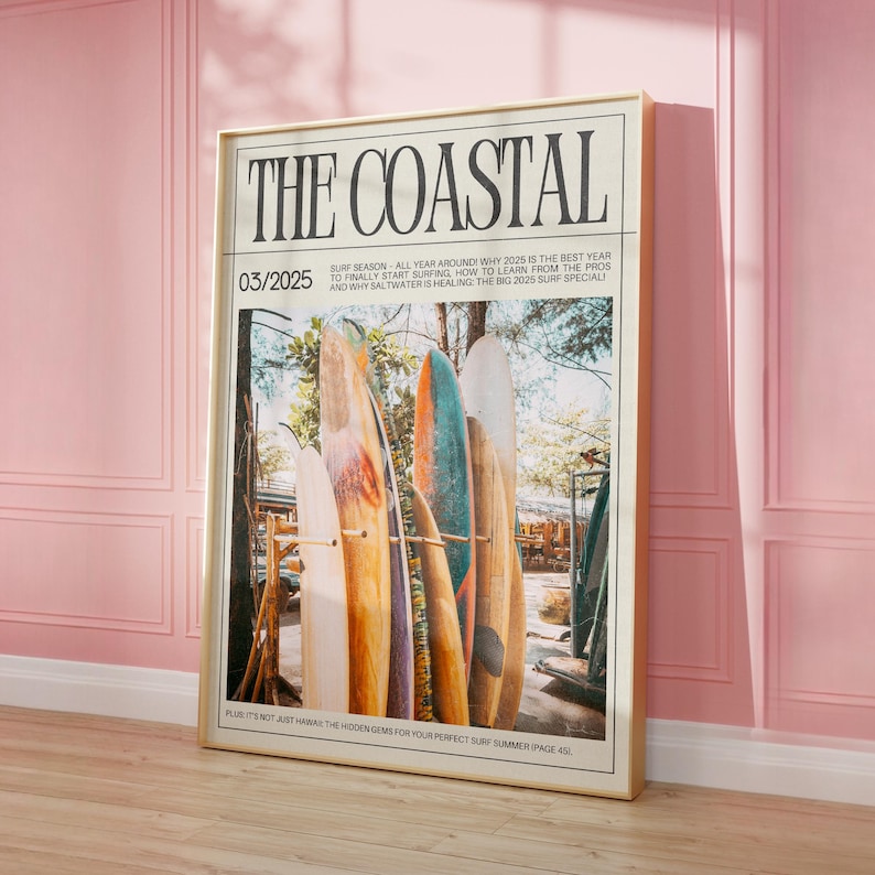 May include: Framed poster titled "THE COASTAL" with a photograph of surfboards. The image features a collection of colorful surfboards leaning against a wooden rack. The poster includes the date 03/2025 and text about surfing.