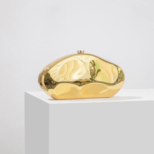 Gold evening clutch bag