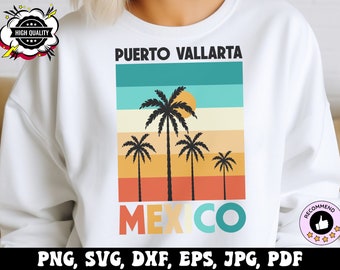 May include: White sweatshirt with a retro-style graphic design featuring palm trees, a sunset, and the text "PUERTO VALLARTA MEXICO".