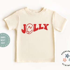 Christmas Kids Shirt - Retro Jolly Happy Face Holiday Season Kids Tee - Winter Kids Shirt - Jolly Christmas Holiday Natural Tee