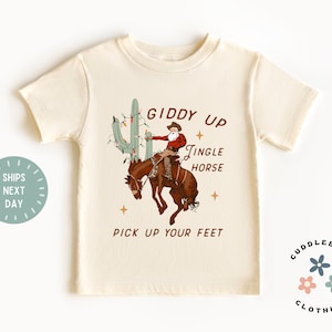 Giddy Up Jingle Horse Kids Christmas Shirt - Vintage Retro Cowboy Santa Holiday Kids Tee - Toddler Boy Girl Gift - Kids Natural Tee