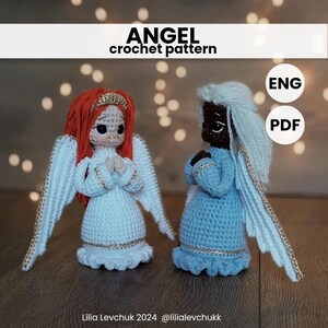 May include: Crochet pattern for making two amigurumi angels. One angel is white with red hair and the other is blue with white hair. The pattern is available in English and is a PDF download. The text "ANGEL crochet pattern" is at the top of the image.