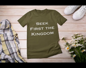 May include: A green t-shirt with the text "SEEK FIRST THE KINGDOM" printed in white on the front.