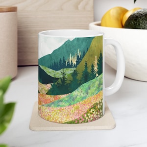 Mountain Meadow Coffee Mug: Floral Landscape Art Cup