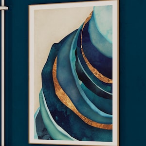 May include: Abstract art print featuring a layered design of blue and teal watercolor shapes with gold accents. The shapes are stacked on top of each other, creating a sense of depth and movement.
