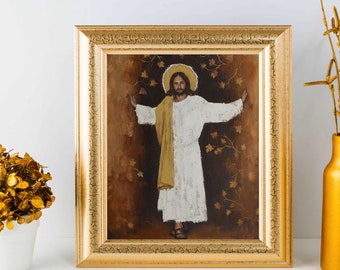 May include: A framed painting of a man with long hair and a beard, wearing a white robe and a gold sash, standing with his arms outstretched against a background of brown and gold leaves.