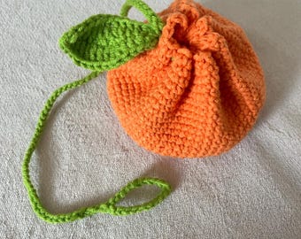 Sacchetto arancione con coulisse/Schema all'uncinetto