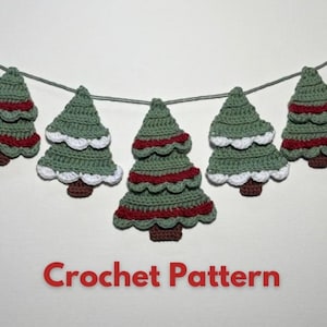 May include: A crochet garland featuring green and red Christmas trees. The garland is strung with white thread and has the text "Crochet Pattern" at the bottom.