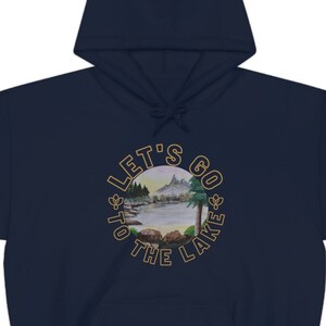 Unisex Heavy Blend Hooded Sweatshirt featuring my Handmade Art Painting and a catchy phrase reading Let's Go to the Lake