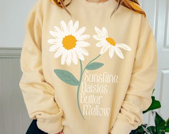 Suéter Weasley Sunshine Daisies Butter Mellow, sudadera COMFORT COLORS con estampado floral para otoño, ideal para amantes de los libros y el mundo mágico. Regalo perfecto para fans de Harry Potter.