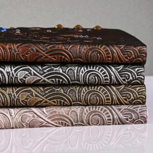 Handmade celestial Bird Journal, 3D embossed fantasy notebook with gemstone accents on vegan PU leather cover. Lined pages, A5 size. Fantasy journal, enchanted diary, whimsical notebook, magical writing notebook, gift for writers, dreamers, and fantasy lovers. Perfect gift for boyfriend or girlfriend. Embossed hardcover with gemstones.