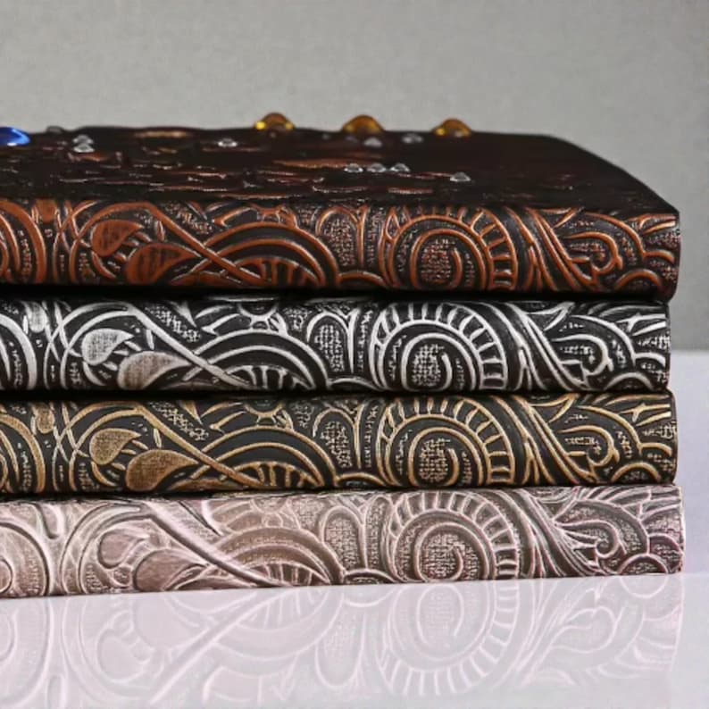 Handmade celestial Bird Journal, 3D embossed fantasy notebook with gemstone accents on vegan PU leather cover. Lined pages, A5 size. Fantasy journal, enchanted diary, whimsical notebook, magical writing notebook, gift for writers, dreamers, and fantasy lovers. Perfect gift for boyfriend or girlfriend. Embossed hardcover with gemstones.