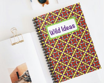 May include: A yellow spiral notebook with a colorful geometric pattern and the words "Wild Ideas" in a green rectangle.