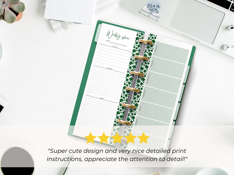 The pages are shown open in a Skinny Mini green binder gold silver rings. It is on a desk next to a laptop and a coffee cup. 5 yellow stars are shown with text from a customer review: Super cute design and very nice detailed print instructions!"