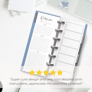 Weekly pages shown open in a Skinny Mini blue binder with silver rings. It is on a desk next to a laptop and a coffee cup. 5 yellow stars are shown with text from a customer review: Super cute design and very nice detailed print instructions!"