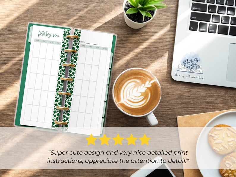 The pages are shown open in a Skinny Mini green binder gold silver rings. It is on a desk next to a laptop and a coffee cup. 5 yellow stars are shown with text from a customer review: Super cute design and very nice detailed print instructions!"