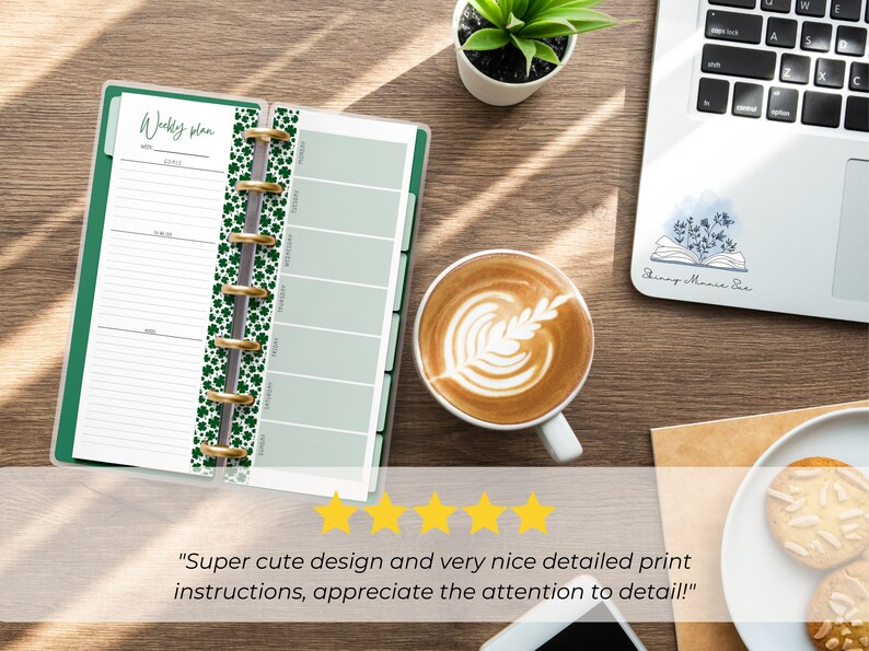 The pages are shown open in a Skinny Mini green binder gold silver rings. It is on a desk next to a laptop and a coffee cup. 5 yellow stars are shown with text from a customer review: Super cute design and very nice detailed print instructions!"