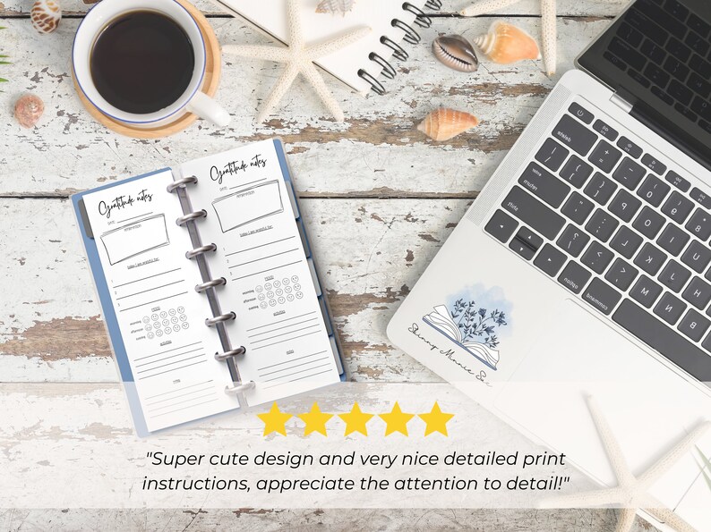 The pages are shown open in a Skinny Mini blue binder with silver rings. It is on a desk next to a laptop and a coffee cup. 5 yellow stars are shown with text from a customer review: Super cute design and very nice detailed print instructions!"