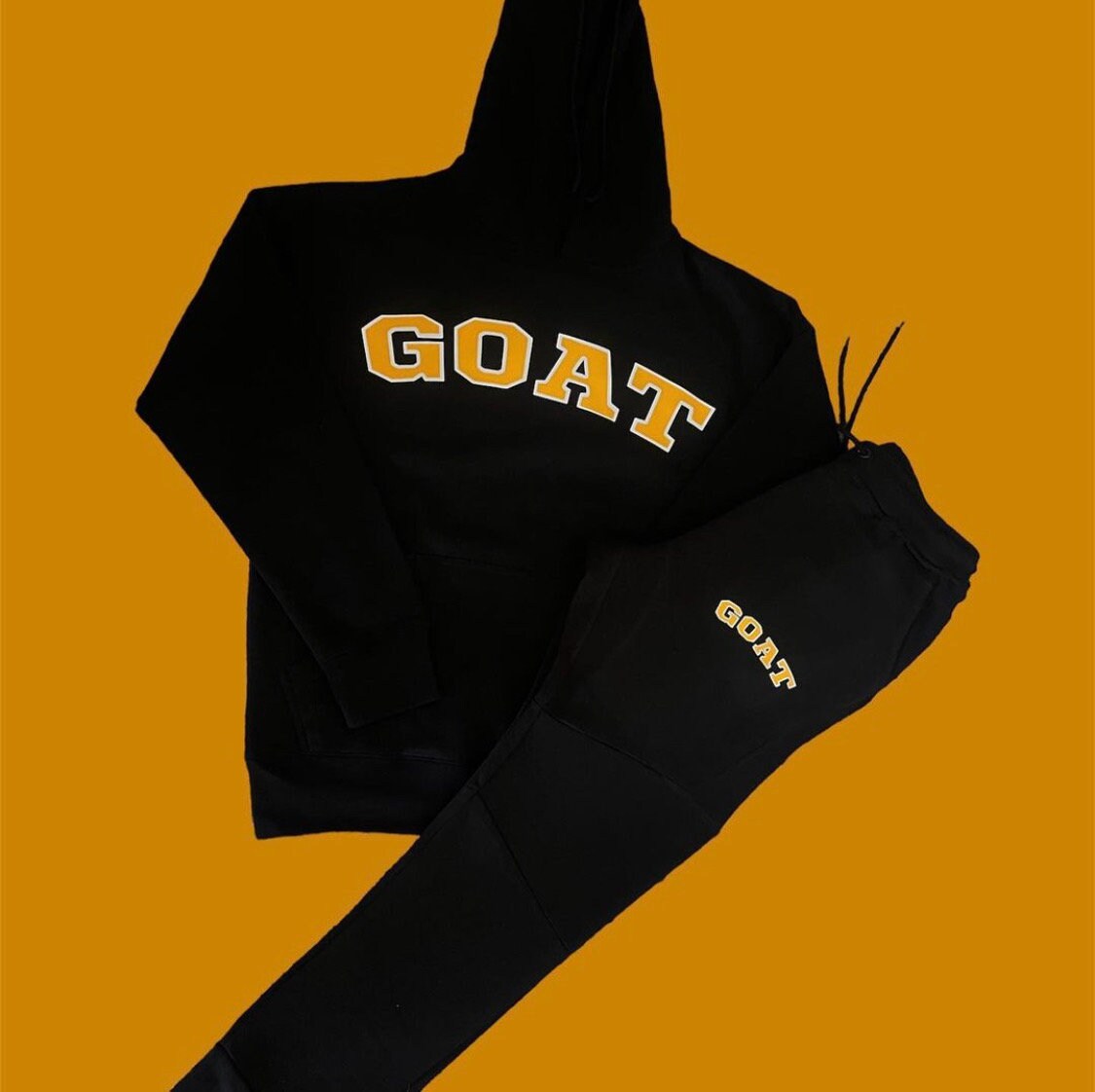 Black and top gold sweatsuit