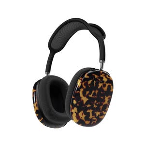 May include: Black headphones with a tortoiseshell pattern on the earcups. The headphones have a padded headband.