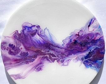 Purple flowing through white background: 12 inch round acrylic Dutch Pour painting on canvas