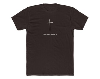 May include: A black t-shirt with a white cross and the text "You were worth it" printed on the front.