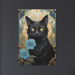 May include: A black cat with yellow eyes sits in a decorative frame with blue flowers. The frame is gold and has a geometric design.