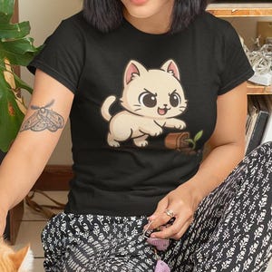 Playful KPOP Kitten Tipping Plant Pot Graphic Tee
