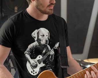 May include: Black t-shirt featuring a dog playing a guitar. The graphic is a black and white illustration of a dog with a guitar. The guitar is a light brown color. The person is holding a light brown guitar.