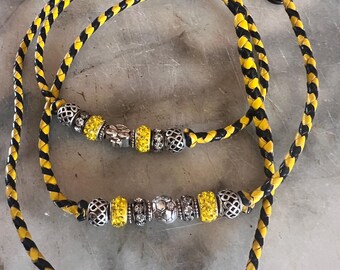 Honey Bee 50" 4 plait kangaroo leather lead with clip and 2 bead clusters.