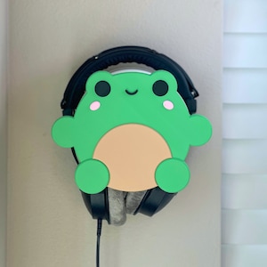 Soporte para auriculares y estante de pared Soporte para auriculares tipo rana (paquete inicial 2 en 1) con placa frontal intercambiable