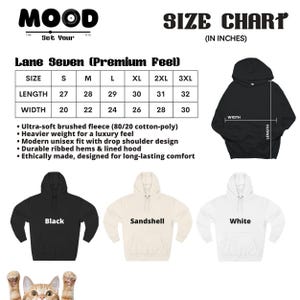 May include: A size chart for Lane Seven hoodies, with measurements in inches. The chart includes length and width dimensions for sizes S through 3XL. The image also shows a black, sandshell, and white hoodie.