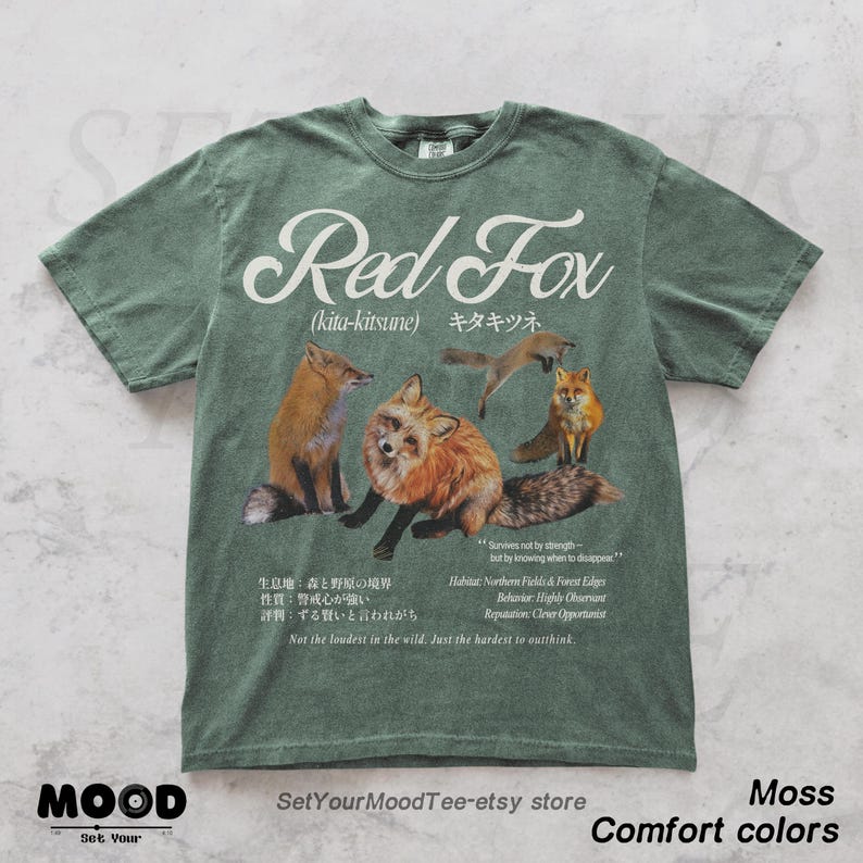 Hokkaido Red Fox graphic t-shirt in Comfort Colors moss, featuring Japanese vintage kitsune wildlife illustration with forest outdoor aesthetic