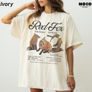 Hokkaido red fox graphic t-shirt in ivory, retro Japanese kitsune fox tee, vintage wildlife illustration shirt, minimalist nature aesthetic outfit