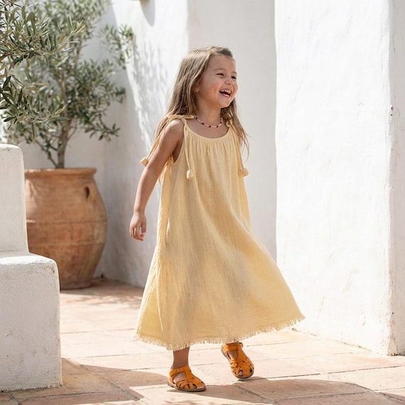 Girls 100% Cotton Maxi Dress, Toddler Boho Beach Sundress, Sleeveless Muslin Summer Gown with Tassel Hem, Adjustable Tie Strap Kids Dress Girls 100% Cotton Maxi Dress, Toddler Boho Beach Sundress, Sleeveless Muslin Summer Gown with Tassel Hem, Adjustable Tie Strap Kids Dress