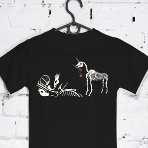 Skeleton unicorn with some old friends printed on a black T-shirt. digital print.